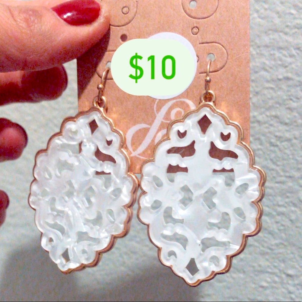 White earrings gold trim